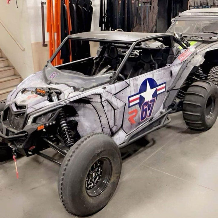 voodoo 2 seat roll cage for canam x3 installed on grey x3 with blue graphics